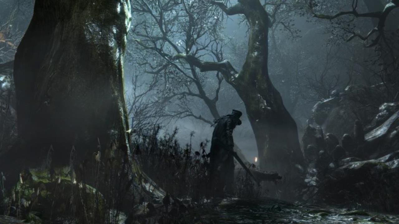 Official screenshot: the hunter aiming a long firearm in a rocky, dark outdoor area.